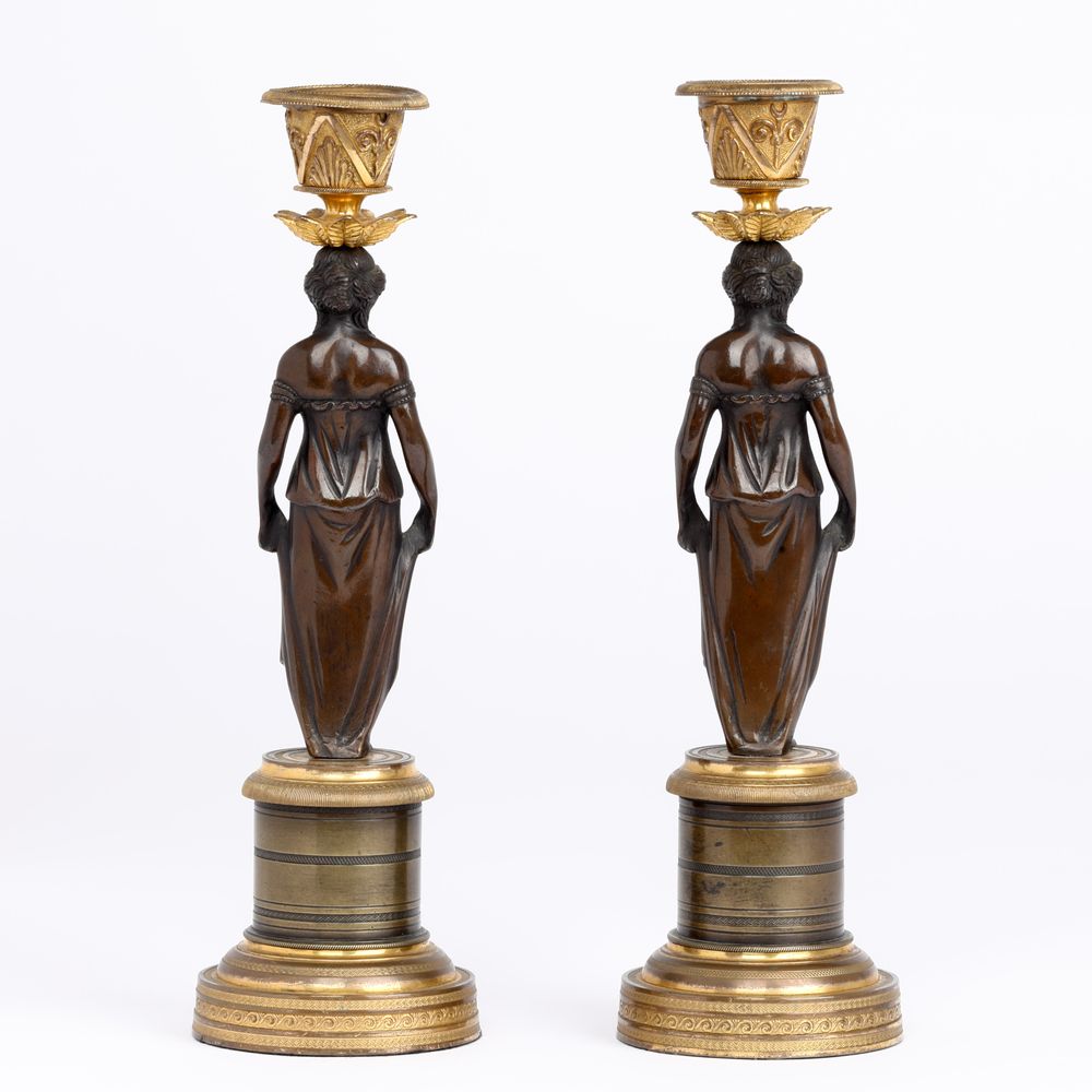 Pair of Regency Bronze and ormolu figural Candlesticks