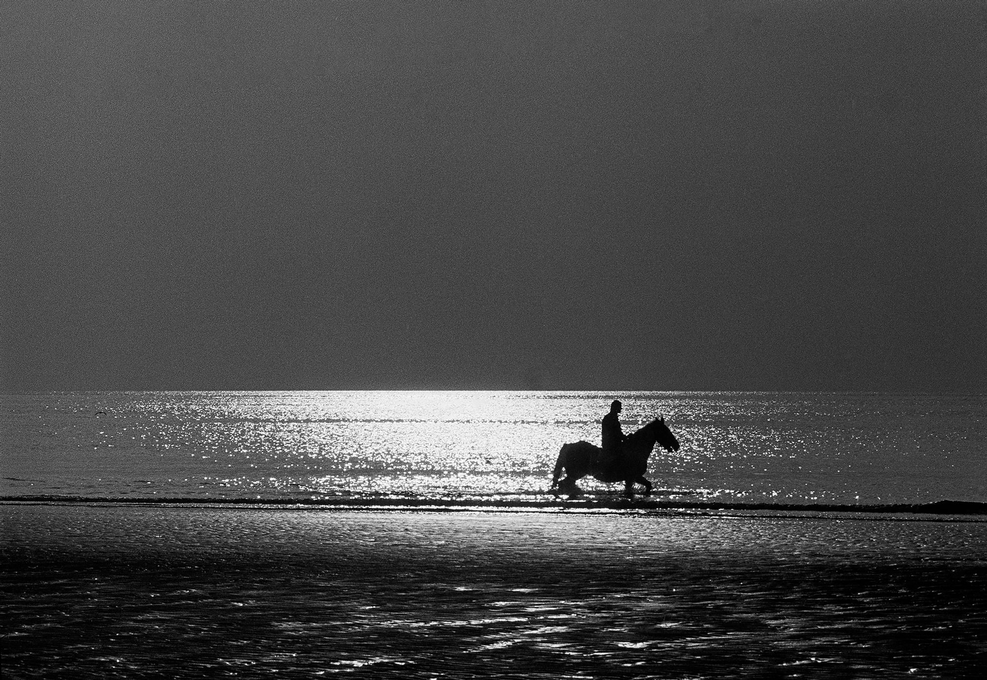 S_BW_Man_Horseback_Beach_11